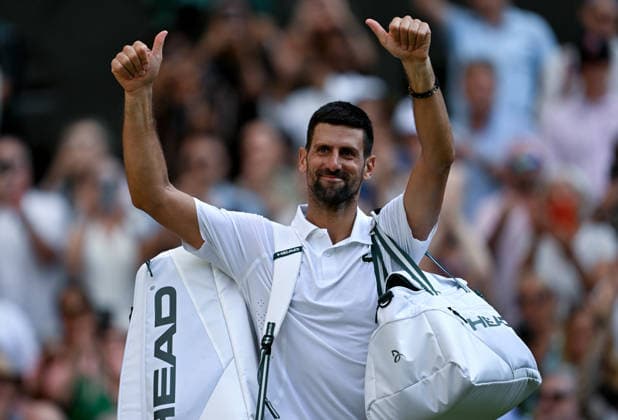 (260711) -- LONDON, July 11, 2026 -- Novak Djokovic greets the spectators after the men s singles semifinal between Jannik Sinner of Italy and Novak Djokovic of Serbia at the Wimbledon Tennis Championships in London, Britain, on July 10, 2026. ) (SP)BRITAIN-LONDON-TENNIS-WIMBLEDON-MEN S SINGLES LixYing 