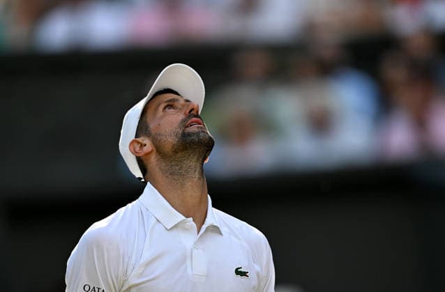 (260711) -- LONDON, July 11, 2026 -- Novak Djokovic reacts during the men s singles semifinal between Jannik Sinner of Italy and Novak Djokovic of Serbia at the Wimbledon Tennis Championships in London, Britain, on July 10, 2026. ) (SP)BRITAIN-LONDON-TENNIS-WIMBLEDON-MEN S SINGLES LixYing 