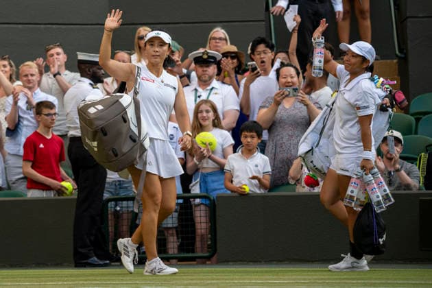 (260711) -- LONDON, July 11, 2026 -- Jiang Xinyu Xu Yifan (L) wave as they leave the court after the women s doubles semi-finals match between Guo Hanyu (China) Kristina Mladenovic (France) and Jiang Xinyu Xu Yifan of China at the Wimbledon Tennis Championships in London, Britain, on July 10, 2026. (Photo by Xinhua) (SP)BRITAIN-LONDON-TENNIS-WIMBLEDON-WOMEN S DOUBLES StephenxChung 