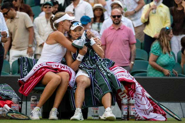 (260711) -- LONDON, July 11, 2026 -- Guo Hanyu (R) Kristina Mladenovic celebrate winning the women s doubles semi-finals match between Guo Hanyu (China) Kristina Mladenovic (France) and Jiang Xinyu Xu Yifan of China at the Wimbledon Tennis Championships in London, Britain, on July 10, 2026. (Photo by Xinhua) (SP)BRITAIN-LONDON-TENNIS-WIMBLEDON-WOMEN S DOUBLES StephenxChung 