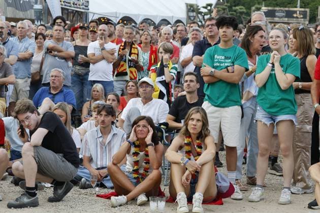 This image shows fans during the screening of a soccer game between Belgian national soccer team Red Devils and Spain, at the Rock Zottegem music festival on Friday 10 July 2026 in Zottegem. The quarter final of the FIFA World Cup, WM, Weltmeisterschaft, Fussball WM, Weltmeisterschaft, Fussball 2026 is shown on a large screen. NICOLASxMAETERLINCK  x180901002x IMAGO NICOLASxMAETERLINCK  x1079514132stx