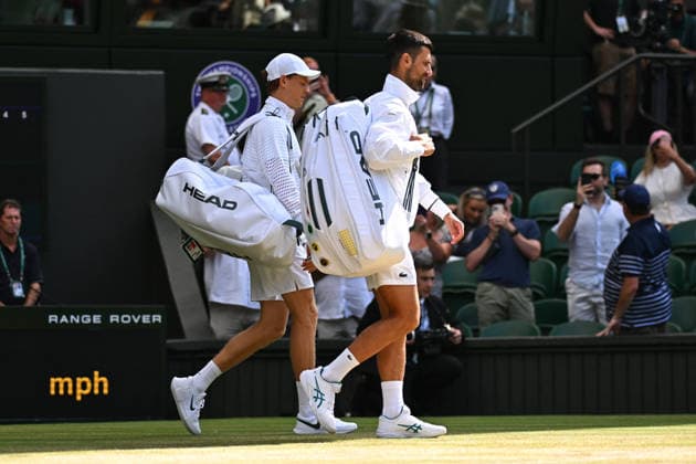 2026 Wimbledon - Semi-Final - Novak Djokovic Jannik Sinner (ITA) with Novak Djokovic (SRB) during their semi final match at the 2026 Wimbledon Championships at the AELTC in London, Great Britain, on July 10, 2026. Photo by Corinne Dubreuil ABACAPRESS.COM LONDON United Kingdom  Copyright: xDubreuilxCorinne ABACAx