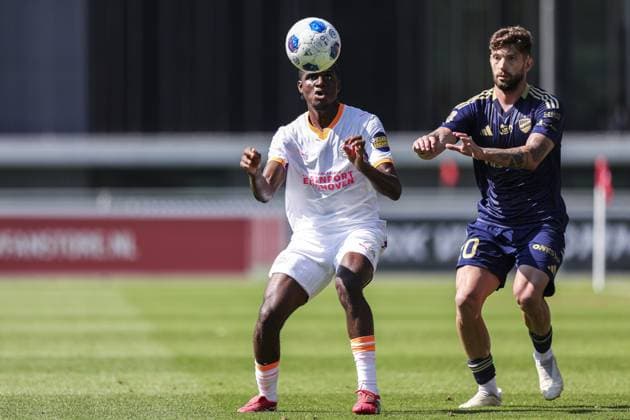 EINDHOVEN , 11-07-2026 , TenCate Stadion De Herdgang , season 2026 2027 , pre season , football , friendly match between PSV and Rakow Czestochowa picture shows PSV Player Madi Monamay and Rakow Czestochowa PlayerJean Carlos Silva PSV - Rakow Czestochowa (friendly)  x204975664x Copyright: