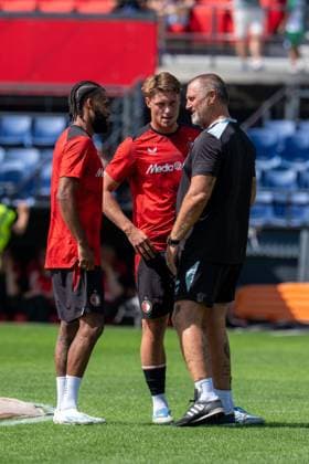ROTTERDAM, 11-07-2026, Stadium Feijenoord de Kuip , Pre-season friendly Feyenoord - Club Brugge , Season 2026 2027 , Picture shows Feyenoord player Jeremiah St. Juste, Feyenoord player Thijs Kraaijeveld and Feyenoord Assistant trainer coach John de Wolf Feyenoord - Club Brugge  x204976100x Copyright: