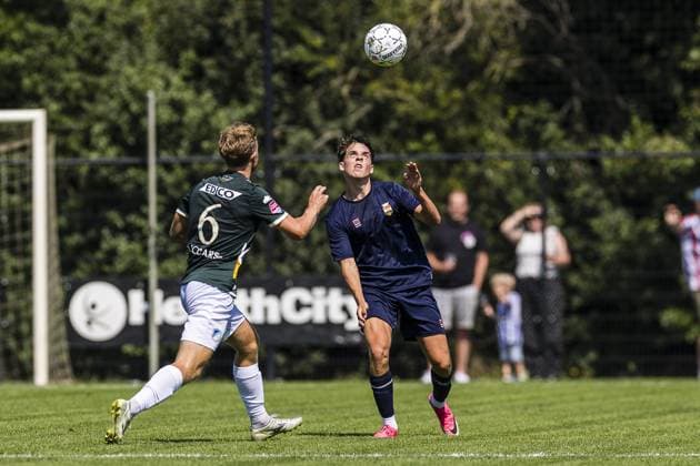 OISTERWIJK , 11-07-2026 , Sportpark Den Donk , season 2026 2027 , Dutch Eredivisie football , match between Willlem II and FC Eindhoven (friedly) , picture shows Eindhoven player Guus Beaumont , Willem II player Julian van Esdonk Willem II - Eindhoven (friendly)  x204976113x Copyright: