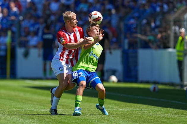 11.07.2026, xydrx, Fußball, Testspiel, FC Gütersloh - FC Schalke 04, Saison 2026 2027, Ohlendorf Stadion im Heidewald: Len Wilkesmann (FC Gütersloh, 15) im Zweikampf gegen Luca Vozar (FC Schalke 04, 38) DFB regulations prohibit any use of photographs as image sequences and or quasi-video. *** July 11, 2026, xydrx, soccer, friendly match, FC Gütersloh vs. FC Schalke 04, 2026–2027 season, Ohlendorf Stadium in Heidewald, Len Wilkesmann (FC Gütersloh), No. 15 in a tackle against Luca Vozar (FC Schalke 04), No. 38. DFB regulations prohibit any use of photographs as image sequences and or quasi-video. Copyright: HMBxMedia YannisxDreimann