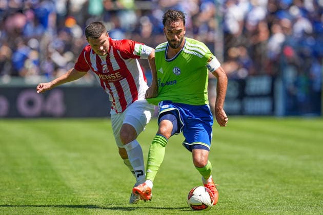 11.07.2026, xydrx, Fußball, Testspiel, FC Gütersloh - FC Schalke 04, Saison 2026 2027, Ohlendorf Stadion im Heidewald: Bjoern Rother (FC Gütersloh, 6) im Zweikampf gegen Kenan Karaman (FC Schalke 04, 19) DFB regulations prohibit any use of photographs as image sequences and or quasi-video. *** July 11, 2026, xydrx, soccer, friendly match, FC Gütersloh vs. FC Schalke 04, 2026–2027 season, Ohlendorf Stadium in Heidewald, Björn Rother (FC Gütersloh), No. 6 in a tackle against Kenan Karaman (FC Schalke 04), 19. DFB regulations prohibit any use of photographs as image sequences and or quasi-video. Copyright: HMBxMedia YannisxDreimann
