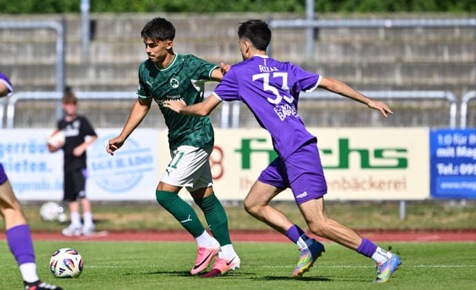 11.07.2026 - Fussball - Saison 2026 2027 - Testspiel Freundschaftsspiel - FC Eintracht Bamberg - SpVgg Greuther Fürth ( Kleeblatt ) - - Sportfoto Zink - xwoxzix - regulations prohibit any use of photographs as image sequences and or quasi-video - only for editorial use - Aaron Keller (11, SpVgg Greuther Fürth ) Emil Rizai (33, FC Eintracht Bamberg ) *** July 11, 2026 Soccer Season 2026–2027 Exhibition Match Friendly Match FC Eintracht Bamberg vs. SpVgg Greuther Fürth Kleeblatt Sports Photo by Zink xwoxzix; regulations prohibit any use of photographs as image sequences and or quasi-video; for editorial use only. Aaron Keller 11, SpVgg Greuther Fürth, Emil Rizai 33, FC Eintracht Bamberg