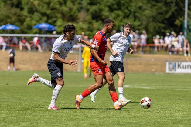 Zweikampf Berke Altintas (SGM Langenau, 07) Marcel Costly (FC Heidenheim, 24), GER, SGM Langenau vs. 1.FC Heidenheim, Fussball, Testspiel, Saison 2026 2027, 11.07.2026, DFL DFB REGULATIONS PROHIBIT ANY USE OF PHOTOGRAPHS AS IMAGE SEQUENCES AND OR QUASI-VIDEO, GER, SGM Langenau vs. 1.FC Heidenheim, Fussball, Testspiel, Saison 2026 2027, 11.07.2026 Langenau *** Head-to-head matchup: Berke Altintas, SGM Langenau, 07 Marcel Costly, FC Heidenheim, 24, GER, SGM Langenau vs. 1 FC Heidenheim, Soccer, Friendly Match, 2026–2027 Season, July 11, 2026, DFL and DFB regulations prohibit any use of photographs as image sequences and or quasi-video, GER, SGM Langenau vs. 1 FC Heidenheim, soccer, friendly match, 2026–2027 season, July 11, 2026, Langenau Copyright: xEibner-Pressefoto JanixPlessx EP_JPL