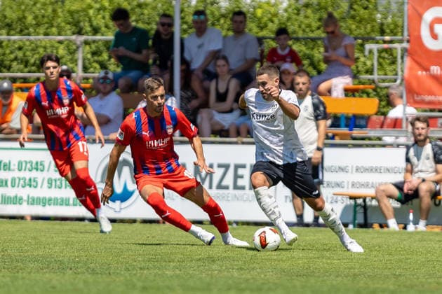 Dynamischer Zweikampf Felix Lutz (SGM Langenau, 08) Marvin Pieringer (FC Heidenheim, 18), GER, SGM Langenau vs. 1.FC Heidenheim, Fussball, Testspiel, Saison 2026 2027, 11.07.2026, DFL DFB REGULATIONS PROHIBIT ANY USE OF PHOTOGRAPHS AS IMAGE SEQUENCES AND OR QUASI-VIDEO, GER, SGM Langenau vs. 1.FC Heidenheim, Fussball, Testspiel, Saison 2026 2027, 11.07.2026 Langenau *** Dynamic One-on-One: Felix Lutz (SGM Langenau), 08 Marvin Pieringer (FC Heidenheim), 18, GER, SGM Langenau vs. 1 FC Heidenheim, Soccer, Friendly Match, 2026–2027 Season, July 11, 2026, DFL and DFB regulations prohibit any use of photographs as image sequences and or quasi-video, GER, SGM Langenau vs. 1 FC Heidenheim, soccer, friendly match, 2026–2027 season, July 11, 2026, Langenau Copyright: xEibner-Pressefoto JanixPlessx EP_JPL