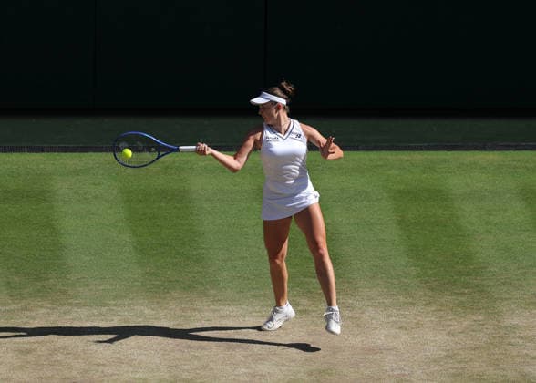RECORD DATE NOT STATED 11th July 2026; All England Lawn Tennis and Croquet Club, London, England; Wimbledon Tennis Tournament, Day Thirteen; Linda Noskova (CZE) with a forehand shot to Karolina Muchova (CZE) JohnxPatrickxFletcher