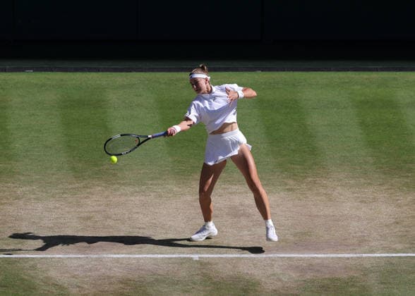 RECORD DATE NOT STATED 11th July 2026; All England Lawn Tennis and Croquet Club, London, England; Wimbledon Tennis Tournament, Day Thirteen; Karolina Muchova (CZE) with a forehand shot to Linda Noskova (CZE) JohnxPatrickxFletcher