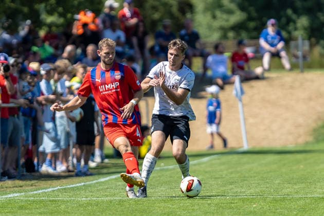 Zweikampf Tim Siersleben (FC Heidenheim, 04), GER, SGM Langenau vs. 1.FC Heidenheim, Fussball, Testspiel, Saison 2026 2027, 11.07.2026, DFL DFB REGULATIONS PROHIBIT ANY USE OF PHOTOGRAPHS AS IMAGE SEQUENCES AND OR QUASI-VIDEO, GER, SGM Langenau vs. 1.FC Heidenheim, Fussball, Testspiel, Saison 2026 2027, 11.07.2026 Langenau *** Tackle by Tim Siersleben, FC Heidenheim, 04, GER, SGM Langenau vs. 1 FC Heidenheim, Soccer, Friendly Match, 2026–2027 Season, July 11, 2026, DFL and DFB regulations prohibit any use of photographs as image sequences and or quasi-video, GER, SGM Langenau vs. 1 FC Heidenheim, soccer, friendly match, 2026–2027 season, July 11, 2026, Langenau Copyright: xEibner-Pressefoto JanixPlessx EP_JPL