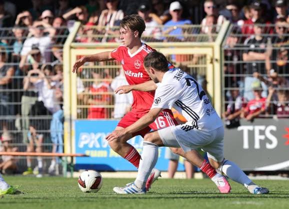 11.07.2026 - Fussball - Saison 2026 2027 - Testspiel Freundschaftsspiel Vorbereitungsspiel: SpVgg Ansbach 09 - 1. FC Nürnberg Nuernberg FCN ( Club ) - Sportfoto Zink DaMa - xdaxmax - Marko Soldic (16, 1. FC Nürnberg FCN ) Eric Weeger (25, SpVgg Ansbach ) *** July 11, 2026 Soccer Season 2026–2027 Exhibition Match Friendly Match Preseason Match SpVgg Ansbach 09 1 FC Nuremberg FCN Club Sports Photo Zink DaMa xdaxmax Marko Soldic 16, 1 FC Nürnberg FCN Eric Weeger 25, SpVgg Ansbach