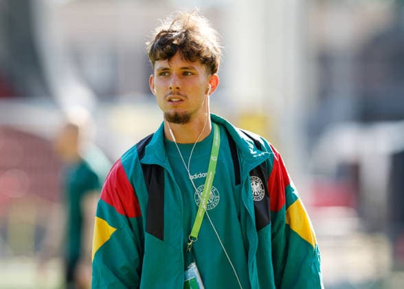 Wrexham, Wales, 11th July 2026. Otto Stange of Germany inspects the pitch ahead of the Spain U19 vs Germany U19 UEFA European U19 Championship Final match at The Racecourse, Wrexham. Picture credit should read: Cody Froggatt Sportimage EDITORIAL USE ONLY. No use with unauthorised audio, video, data, fixture lists, club league logos or live services. Online in-match use limited to 120 images, no video emulation. No use in betting, games or single club league player publications. SPI_008_CF_SPAIN_U19_V_GERMANY_U19_FINAL SPI-4858-0008