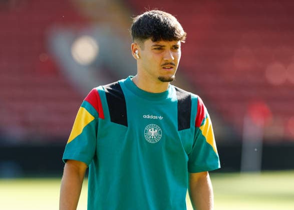 Wrexham, Wales, 11th July 2026. Rafael Pinto Pedrosa of Germany inspects the pitch ahead of the Spain U19 vs Germany U19 UEFA European U19 Championship Final match at The Racecourse, Wrexham. Picture credit should read: Cody Froggatt Sportimage EDITORIAL USE ONLY. No use with unauthorised audio, video, data, fixture lists, club league logos or live services. Online in-match use limited to 120 images, no video emulation. No use in betting, games or single club league player publications. SPI_009_CF_SPAIN_U19_V_GERMANY_U19_FINAL SPI-4858-0009