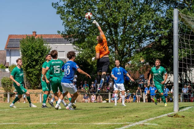 Spielszene, Parade Kevin Darmstaedter (VfR Fehlheim, 01) vereitelt einen Torschuss, GER, VfR Fehlheim vs. SV Darmstadt 98, Fussball, Testspiel, Saison 2026 2027, 11.07.2026, DFL REGULATIONS PROHIBIT ANY USE OF PHOTOGRAPHS AS IMAGE SEQUENCES AND OR QUASI-VIDEO, GER, VfR Fehlheim vs. SV Darmstadt 98, Fussball, Testspiel, Saison 2026 2027, 11.07.2026 Bensheim-Fehlheim *** Game scene: Kevin Darmstaedter of VfR Fehlheim (No. 01) blocks a shot on goal, GER, VfR Fehlheim vs. SV Darmstadt 98, soccer, friendly match, 2026–2027 season, July 11, 2026, DFL regulations prohibit any use of photographs as image sequences and or quasi-video, GER, VfR Fehlheim vs. SV Darmstadt 98, soccer, friendly match, 2026–2027 season, July 11, 2026, Bensheim Fehlheim Copyright: xEibner-Pressefoto J-NxGroemlingx EP_JGG