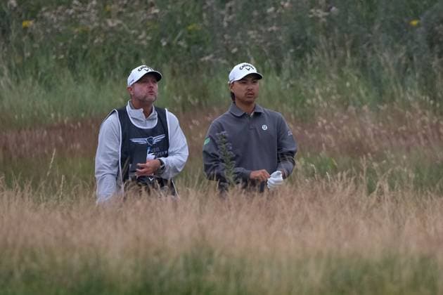 UK: The Genesis Scottish Open at The Renaissance Club, North Berwick, Scotland on 11 July 2026: Pictured: Min Woo Lee (Australia) and his caddie Shane Joel in the rough on the 1st fairway during the third round of the Genesis Scottish Open Championship 2026 North Berwick The Renaissance Club Scotland Scotland Copyright: xAlexxToddx