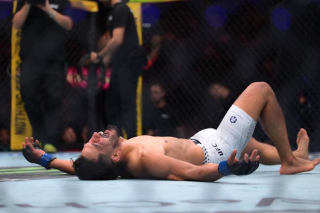 July 11, 2026, Las Vegas, Nevada, USA: ADRIAN YANEZ (C) in the ground celebrating after defeated CODY GARBRANDT (not in picture) by TKO (strikes) at 2:47 of Round 1 during UFC 329 at the T-Mobile Arena in Las Vegas. UFC 329: Adrian Yanez Defeated Cody Garbrandt By TKO  - ZUMAo117 20260711_zsp_o117_048 Copyright: xMikaelxOnax