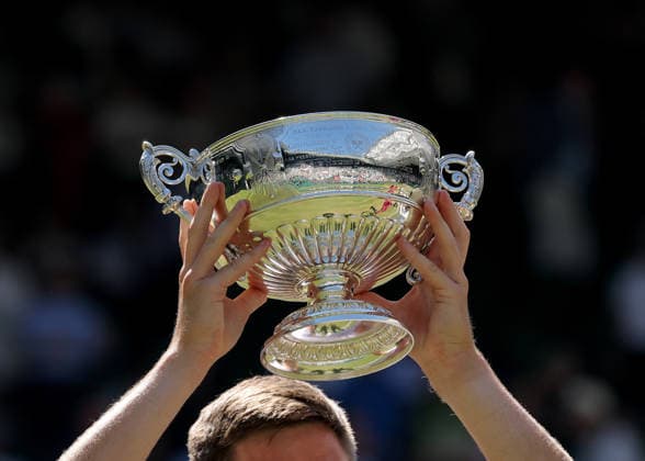 RECORD DATE NOT STATED 11th July 2026; All England Lawn Tennis and Croquet Club, London, England; Wimbledon Tennis Tournament, Day Thirteen; Henry Patten (GBR) lifts his Gentlemen& x2019;s Doubles trophy JohnxPatrickxFletcher