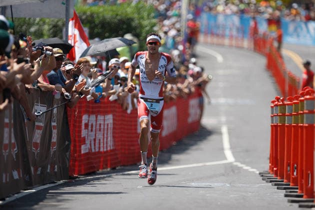 USA HAWAII IRONMAN Ironman World Championship, WM, Weltmeisterschaft epa05078764 Jan Frodeno of Germany begins the third and final leg of the Ironman World Championship, running up Palani Road in Kailua-Kona, Hawaii 10 October 2015 Kailua-Kona United States  Copyright: xBrucexOmorix