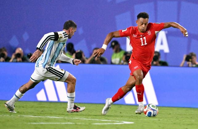 FIFA World Cup, WM, Weltmeisterschaft, Fussball 2026 quarterfinals - Argentina vs Switzerland Dan Ndoye (R) of Switzerland and Rodrigo De Paul of Argentina in action during the FIFA World Cup 2026 quarterfinals match Argentina vs Switzerland, in Kansas City, USA, 11 July 2026. KANSAS CITY United States  Copyright: xAMYxKONTRASx