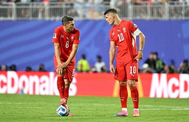 FIFA World Cup, WM, Weltmeisterschaft, Fussball 2026 quarterfinals - Argentina vs Switzerland Remo Freuler (L) of Switzerland talks to teammate Granit Xhaka during the FIFA World Cup 2026 quarterfinals match Argentina vs Switzerland, in Kansas City, USA, 11 July 2026. KANSAS CITY United States  Copyright: xAMYxKONTRASx