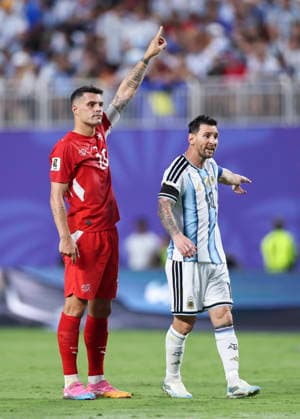 (260712) -- KANSAS CITY, July 12, 2026 -- Granit Xhaka (L) of Switzerland and Lionel Messi of Argentina are seen during the quarter final match between Argentina and Switzerland at the 2026 FIFA World Cup, WM, Weltmeisterschaft, Fussball at the Kansas City Stadium in Kansas City, the United States, July 11, 2026. ) (SP)U.S.-KANSAS CITY-FOOTBALL-FIFA WORLD CUP-QUARTER FINAL-ARG VS SUI LixMing 