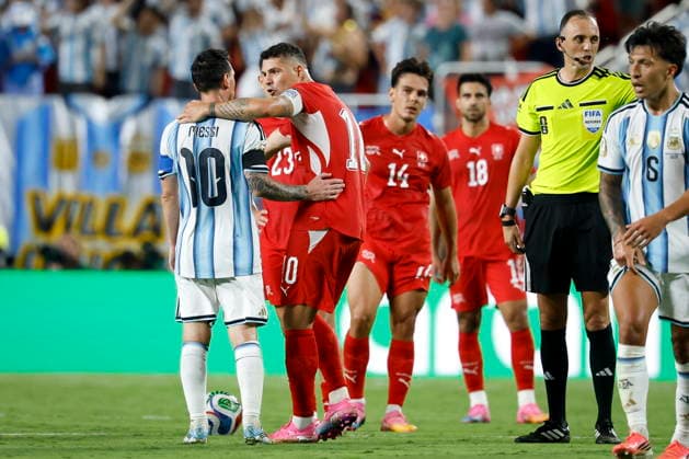 FIFA World Cup, WM, Weltmeisterschaft, Fussball 2026 quarterfinals - Argentina vs Switzerland Argentina s Lionel Messi (L) talks with Switzerland s Granit Xhaka during the FIFA World Cup 2026 quarterfinals match Argentina vs Switzerland, in Kansas City, Missouri, USA, 11 July 2026. Kansas City United States  Copyright: xPETERxKLAUNZERx