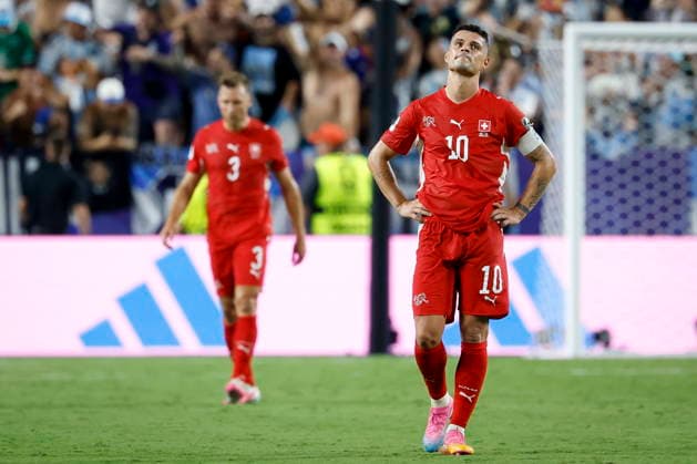 FIFA World Cup, WM, Weltmeisterschaft, Fussball 2026 quarterfinals - Argentina vs Switzerland Switzerland s Granit Xhaka looks dejected after conceding the 3-1 goal during the FIFA World Cup 2026 quarterfinals match Argentina vs Switzerland, in Kansas City, Missouri, USA, 11 July 2026. Kansas City United States  Copyright: xPETERxKLAUNZERx