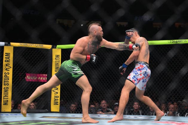 July 11, 2026, Las Vegas, Nevada, USA: CONOR MCGREGOR (L) throw a left punch to MAX HOLLOWAY (R) by TKO during UFC 329 at the T-Mobile Arena in Las Vegas. UFC 329: Max Holloway Defeated Conor McGregor By TKO  - ZUMAo117 20260711_zsp_o117_078 Copyright: xMikaelxOnax