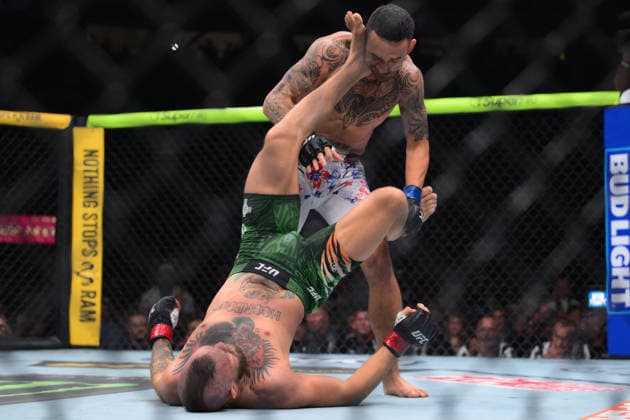 July 11, 2026, Las Vegas, Nevada, USA: MAX HOLLOWAY (top) defeated CONOR MCGREGOR (bottom) by TKO (knee injury) at 1:09 of Round 1 during UFC 329 at the T-Mobile Arena in Las Vegas. UFC 329: Max Holloway Defeated Conor McGregor By TKO  - ZUMAo117 20260711_zsp_o117_084 Copyright: xMikaelxOnax