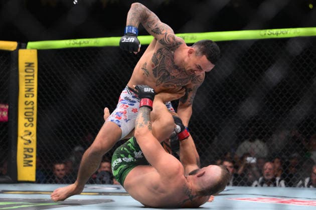 July 11, 2026, Las Vegas, Nevada, USA: MAX HOLLOWAY (top) defeated CONOR MCGREGOR (bottom) by TKO (knee injury) at 1:09 of Round 1 during UFC 329 at the T-Mobile Arena in Las Vegas. UFC 329: Max Holloway Defeated Conor McGregor By TKO  - ZUMAo117 20260711_zsp_o117_093 Copyright: xMikaelxOnax