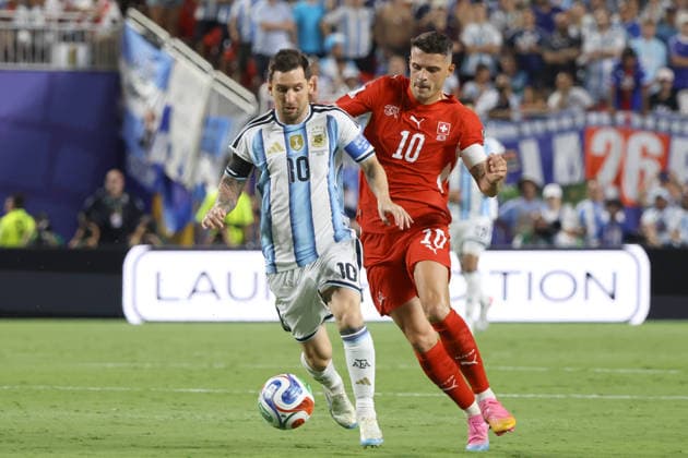 Lionel Messi (L) of Argentina vies for the ball with Granit Xhaka of Switzerland during a FIFA World Cup, WM, Weltmeisterschaft, Fussball 2026 quarter-final match between Argentina and Switzerland at Arrowhead Stadium in Kansas City, USA, 11 July 2026. FIFA World Cup 2026: Argentina - Switzerland !ACHTUNG: NUR REDAKTIONELLE NUTZUNG!  Copyright: xKennethxFernándezx GR7104 20260712-55020871674_1