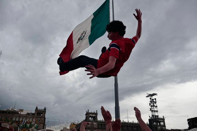 July 11, 2026, Mexico City, Cdmx, Mexico: In a closely contested match between the England and Norway national teams, hundreds of Mexican fansÃ¢â‚¬supporters of the Vikings and their star player Erling HaalandÃ¢â‚¬had to accept the English team s victory; goals from Jude Bellingham knocked the Nordic side out of the 2026 FIFA World Cup, WM, Weltmeisterschaft, Fussball The Mexican fans arrived at the Fan Festival wearing the famous Vikings team jerseys, face paint, and flagsÃ¢â‚¬with some even sporting horned helmetsÃ¢â‚¬and they even performed a rowing motion in Mexico City s ZoÂ³calo. Norway Is Eliminated From The World Cup..  - ZUMAp204 0861357075st Copyright: xJosuexPerezx