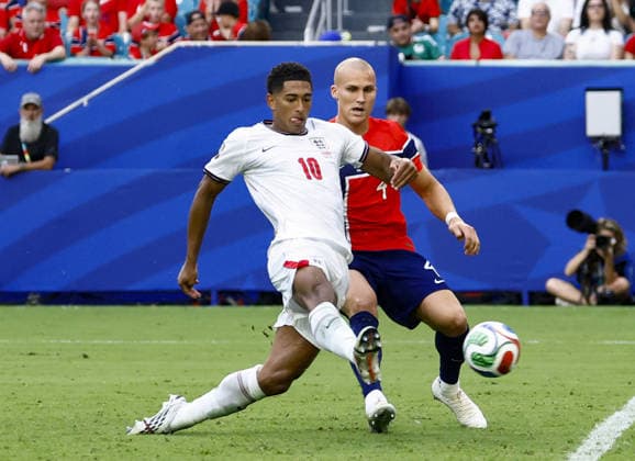 Football: 2026 World Cup England s Jude Bellingham (L) scores the winner in the first half of extra time in a World Cup quarterfinal football match against Norway at Miami Stadium in Miami Gardens, Florida, on July 11, 2026.  A14AA0005622664P