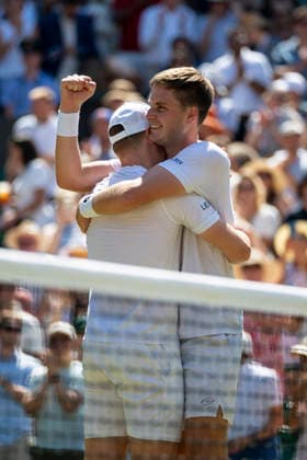 (260712) -- LONDON, July 12, 2026 -- Harri Heliovaara (R) Henry Patten react during the men s doubles final match between Harri Heliovaara (Finland) Henry Patten (Britain) and Marcelo Arevalo (El Salvador) Mate Pavic (Croatia) at the Wimbledon Tennis Championships in London, Britain, on July 11, 2026. (Photo by Xinhua) (SP)BRITAIN-LONDON-TENNIS-WIMBLEDON-MEN S DOUBLES StephenxChung 