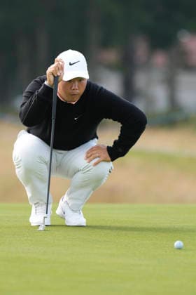 NORTH BERWICK, SCOTLAND - JULY 12: Tom Kim lines up a putt on the 11th green during the delayed Round 3 of the Genesis Scottish Open at the Renaissance Club, North Berwick on July 12, 2026 in North Berwick, Scotland Genesis Scottish Open Round 3
