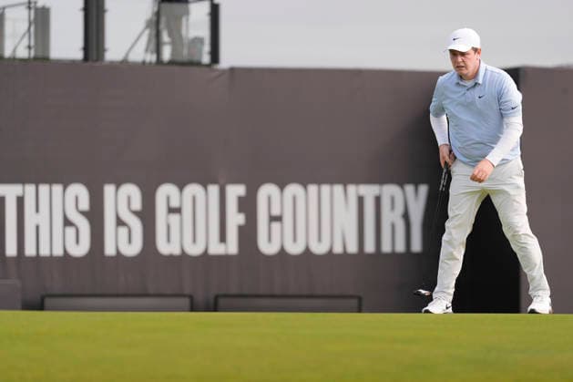 NORTH BERWICK, SCOTLAND - JULY 12: Robert MacIntyre on the 18th green during the delayed Round 3 of the Genesis Scottish Open at the Renaissance Club, North Berwick on July 12, 2026 in North Berwick, Scotland Genesis Scottish Open Round 3