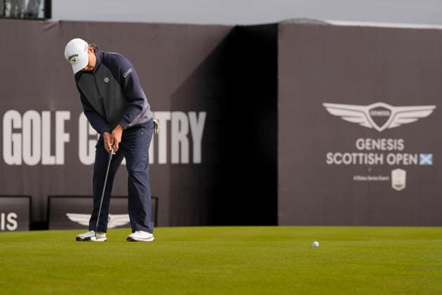 NORTH BERWICK, SCOTLAND - JULY 12: Min Woo Lee putts on the 18th green during the delayed Round 3 of the Genesis Scottish Open at the Renaissance Club, North Berwick on July 12, 2026 in North Berwick, Scotland Genesis Scottish Open Round 3