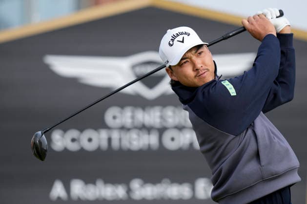 NORTH BERWICK, SCOTLAND - JULY 12: Min Woo Lee plays from the twelfth tee during the delayed Round 3 of the Genesis Scottish Open at the Renaissance Club, North Berwick on July 12, 2026 in North Berwick, Scotland Genesis Scottish Open Round 3