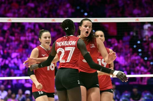 (260712) -- HONG KONG, July 12, 2026 -- Players of Canada celebrate scoring during the match between Canada and the Dominican Republic at the Women s Volleyball Nations League (VNL) 2026 in Hong Kong, south China, July 12, 2026. ) (SP)CHINA-HONG KONG-VOLLEYBALL-NATIONS LEAGUE-WOMEN-CAN VS DOM (CN) LoxPingxFai 