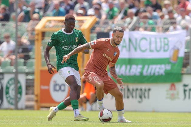 12.07.2026, xtgx, Fussball Testspiel, BSG Chemie Leipzig - 1. FC Magdeburg emspor, v.l. Marc Sodji (Chemie), Falko Michel (Magdeburg, 21) Zweikampf, Duell, Kampf, tackle Zweikampf, Duell, Kampf, tackle (DFL DFB REGULATIONS PROHIBIT ANY USE OF PHOTOGRAPHS as IMAGE SEQUENCES and or QUASI-VIDEO) Leipzig *** July 12, 2026, xtgx, soccer exhibition match, BSG Chemie Leipzig vs. 1. FC Magdeburg emspor, from left: Marc Sodji (Chemie), Falko Michel (Magdeburg), 21 Tackle, duel, battle, tackle Tackle, duel, battle, tackle DFL DFB REGULATIONS PROHIBIT ANY USE OF PHOTOGRAPHS as IMAGE SEQUENCES and or QUASI-VIDEO Leipzig