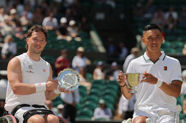 RECORD DATE NOT STATED 12th July 2026; All England Lawn Tennis and Croquet Club, London, England; Wimbledon Tennis Tournament, Final Day; Tokito Oda (JPN) lifts the Gentlemens Wheelchair Single trophy alongside Alfie Hewett (GBR) JohnxPatrickxFletcher