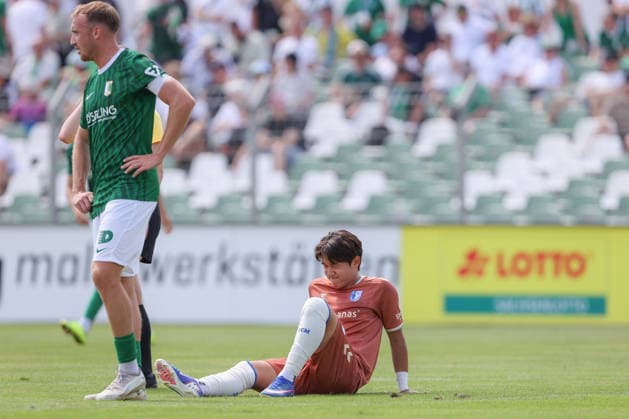 12.07.2026, xtgx, Fussball Testspiel, BSG Chemie Leipzig - 1. FC Magdeburg emspor, v.l. Do Young Yoon (Magdeburg, 27) verletzt, Verletzung, injury, injured (DFL DFB REGULATIONS PROHIBIT ANY USE OF PHOTOGRAPHS as IMAGE SEQUENCES and or QUASI-VIDEO) Leipzig *** July 12, 2026, xtgx, Soccer friendly match, BSG Chemie Leipzig vs. FC Magdeburg emspor, from left: Do Young Yoon (Magdeburg), 27, injured, injury, injured. DFL and DFB regulations prohibit any use of photographs as image sequences and or quasi-video. Leipzig