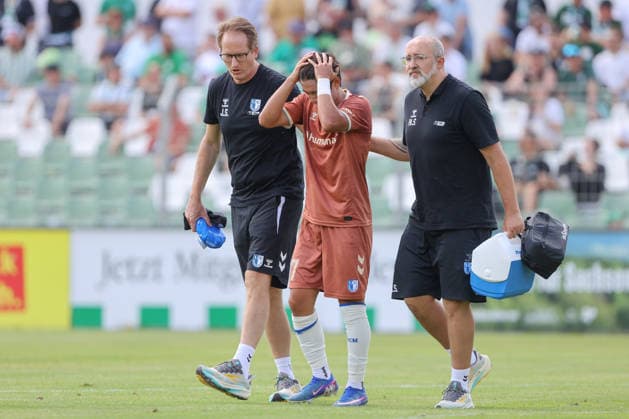 12.07.2026, xtgx, Fussball Testspiel, BSG Chemie Leipzig - 1. FC Magdeburg emspor, v.l. Do Young Yoon (Magdeburg, 27) verletzt, Verletzung, injury, injured (DFL DFB REGULATIONS PROHIBIT ANY USE OF PHOTOGRAPHS as IMAGE SEQUENCES and or QUASI-VIDEO) Leipzig *** July 12, 2026, xtgx, Soccer friendly match, BSG Chemie Leipzig vs. FC Magdeburg emspor, from left: Do Young Yoon (Magdeburg), 27, injured, injury, injured. DFL and DFB regulations prohibit any use of photographs as image sequences and or quasi-video. Leipzig