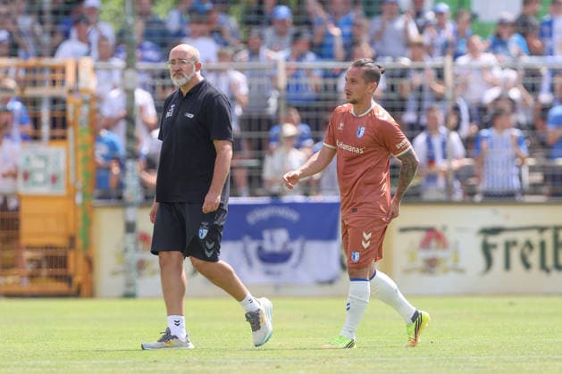 12.07.2026, xtgx, Fussball Testspiel, BSG Chemie Leipzig - 1. FC Magdeburg emspor, v.l. Baris Atik (Magdeburg, 23) verletzt, Verletzung, injury, injured (DFL DFB REGULATIONS PROHIBIT ANY USE OF PHOTOGRAPHS as IMAGE SEQUENCES and or QUASI-VIDEO) Leipzig *** July 12, 2026, xtgx, Soccer friendly match, BSG Chemie Leipzig vs. FC Magdeburg emspor, from left: Baris Atik (Magdeburg), 23 injured, injury, injured DFL DFB REGULATIONS PROHIBIT ANY USE OF PHOTOGRAPHS as IMAGE SEQUENCES and or QUASI-VIDEO Leipzig