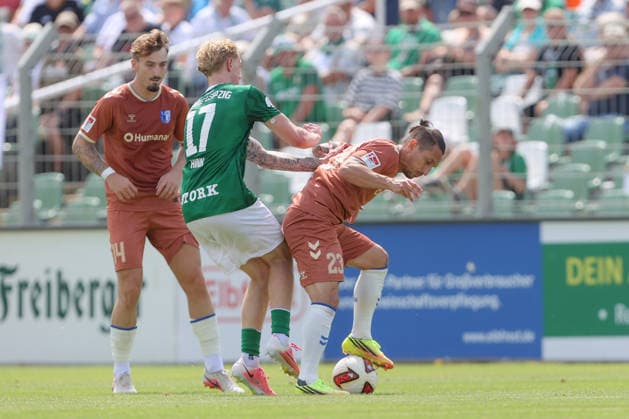 12.07.2026, xtgx, Fussball Testspiel, BSG Chemie Leipzig - 1. FC Magdeburg emspor, v.l. Hector Hink (Chemie) Baris Atik (Magdeburg, 23) Zweikampf, Duell, Kampf, tackle (DFL DFB REGULATIONS PROHIBIT ANY USE OF PHOTOGRAPHS as IMAGE SEQUENCES and or QUASI-VIDEO) Leipzig *** July 12, 2026, xtgx, soccer friendly, BSG Chemie Leipzig vs. 1. FC Magdeburg emspor, from left: Hector Hink (Chemie), Baris Atik (Magdeburg), 23 Tackle, duel, battle, DFL DFB REGULATIONS PROHIBIT ANY USE OF PHOTOGRAPHS as IMAGE SEQUENCES and or QUASI-VIDEO Leipzig