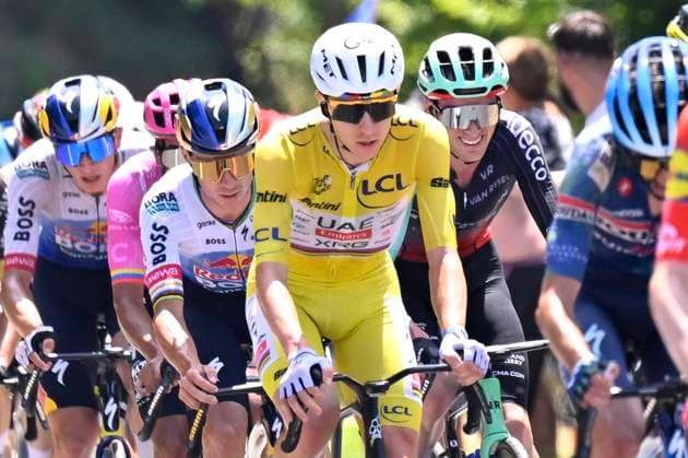 Sport Bilder des Tages Tour de France 2026 Stage 9 USSEL, FRANCE - JULY 12 : Pogacar Tadej (SLO) of UAE Team Emirates - XRG, Evenepoel Remco (BEL) of Red Bull - BORA - Hansgrohe during stage 9 of the 113rd edition of Tour de France an UCI World Tour 2.UWT cycling road race stage for Men Elite of 185 km with start in Malemort and finish in Ussel on July 12, 2026 in Ussel, France, 12 07 2026 ( Motordriver Kurt Vandenborre - Ussel France  Copyright: xTomasxSiskx