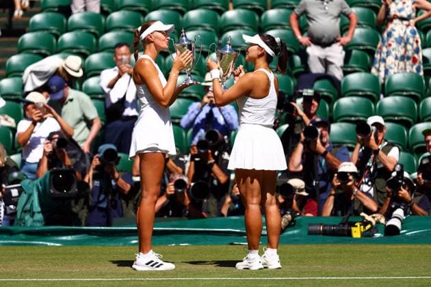 Hanyu Guo and Kristina Mladenovic celebrate victory in the Ladies Doubles Final Wimbledon Tennis Championships, Day 14, The All England Lawn Tennis and Croquet Club, London, UK - 12 Jul 2026London The All England Lawn Tennis and United Kingdom  Copyright: xJamesxMarsh Shutterstockx 16981035cw